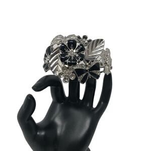 Silver Bracelet with Black enamel flowers/bows